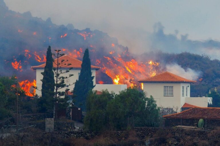 Thousands Flee As Lava Spewing From Volcano On Spain’s La Palma Island Destroys Houses
