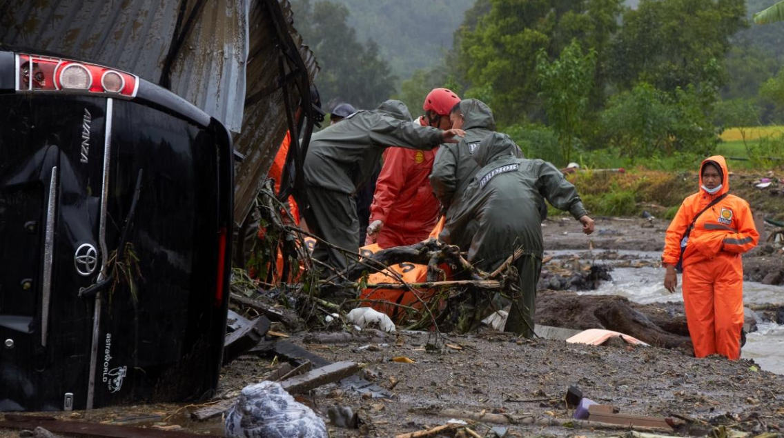 ‘I decided I’d die’: Indonesia’s flood victims recount stories of survival